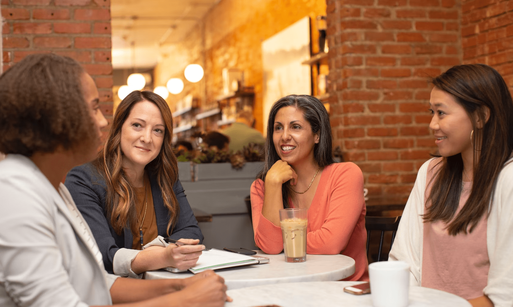 Women meeting in DEI-centered group.