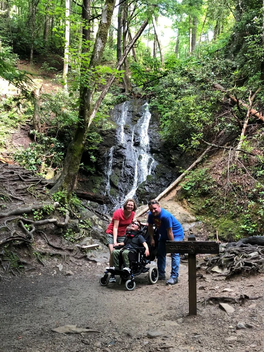 Family picture at waterfall in Gatlinburg, Tennessee.