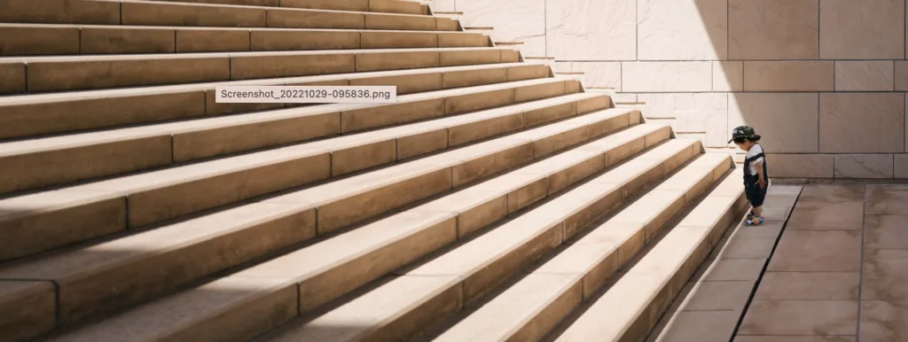 Baby looking at steps and setting goals.